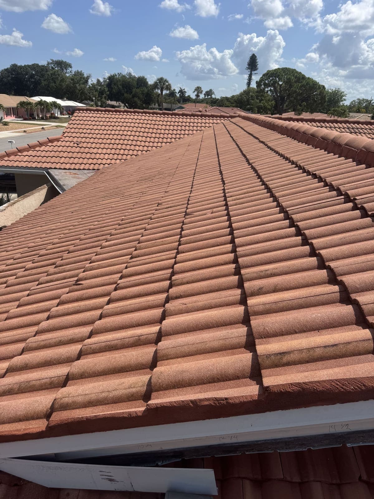 A Florida tile roof after professional soft washing, restored to a bright, clean finish